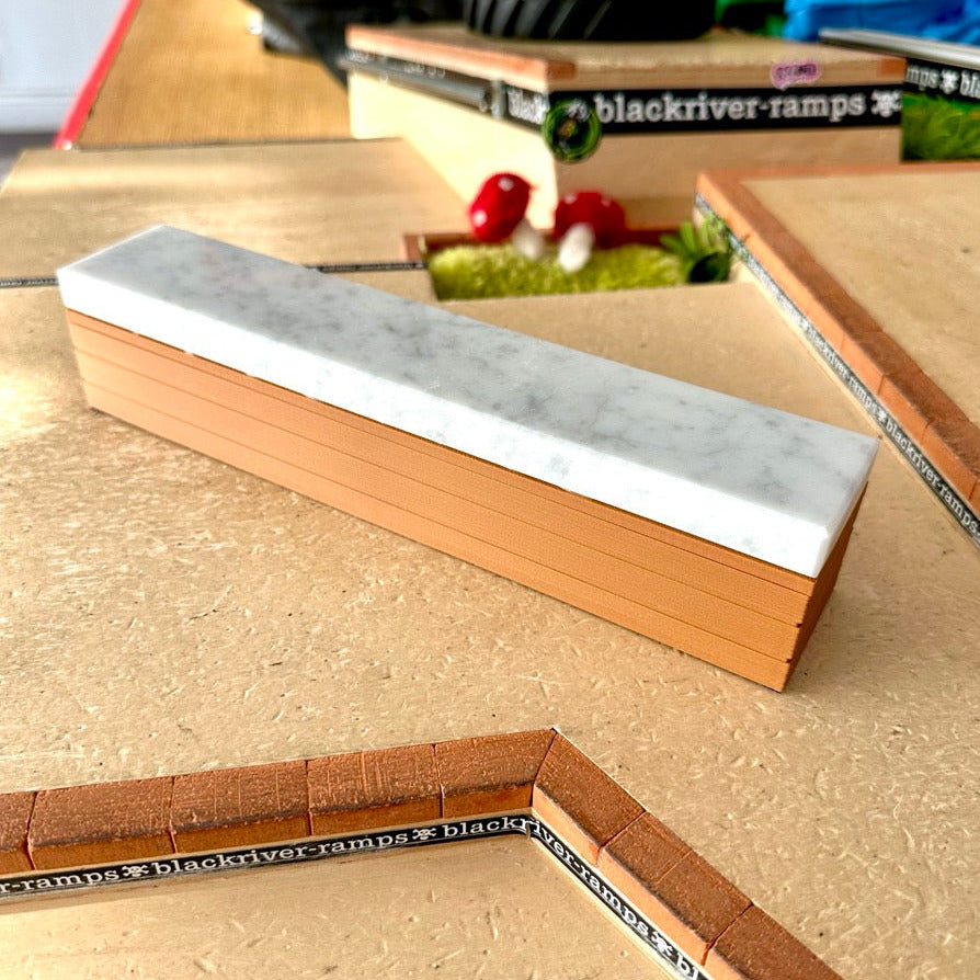 Rectangular fingerboard obstacle with marble top and 3d printed base, 
