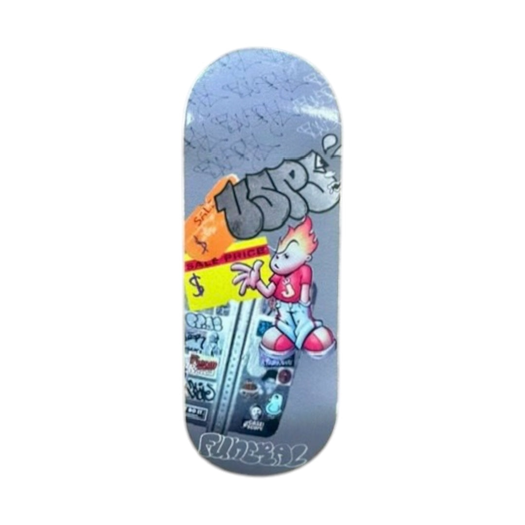 fingerboard deck with cartoon character and colorful graphics on a white background